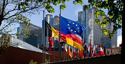 Flags in front of a conference center